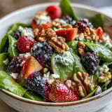 Fresh baby spinach and mixed berries tossed in a tangy homemade vinaigrette for a light, refreshing lunch.  