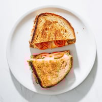 Golden-brown jalapeño-studded bread encases melted pepper jack cheese and fresh tomato slices in this spicy grilled cheese sandwich.  